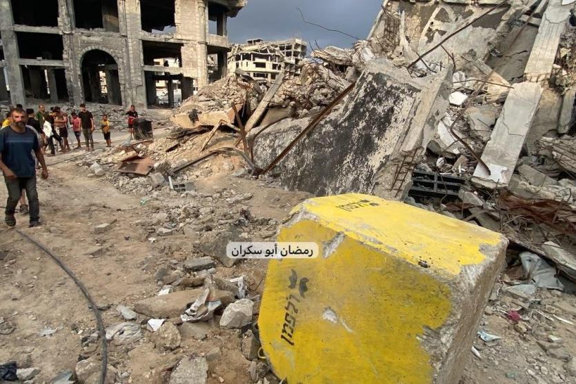 غزہ شہر میں تباہ شدہ عمارتوں کے درمیان اسرائیلی ‘زرد لائن’ کا نشان